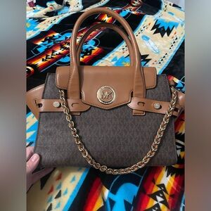 Used condition but lots of life Michael Kors purse